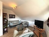 Wohnzimmersitzecke mit Fernseher Wohnzimmersitzecke mit Fernseher