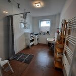 Duschbad mit Waschmaschine Duschbad mit Waschmaschine
