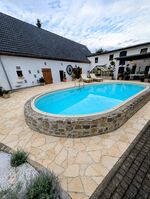 Monteurwohnung "Poolside Cottage" Bild 1 Monteurwohnung "Poolside Cottage" Bild 1