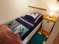1. Schlafzimmer mit drei Einzelbetten 1. Schlafzimmer mit drei Einzelbetten