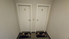 Eingang zu den Gemeinschaft Toiletten Eingang zu den Gemeinschaft Toiletten