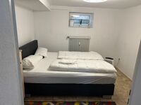 Schlafzimmer 1 mit Doppel-Boxspringbett Schlafzimmer 1 mit Doppel-Boxspringbett