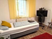 gelbes Zimmer, 2 Einzelbetten, TV gelbes Zimmer, 2 Einzelbetten, TV