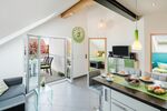 Große Ferienwohnungen mit ruhigem Balkon zum Garten Große Ferienwohnungen mit ruhigem Balkon zum Garten