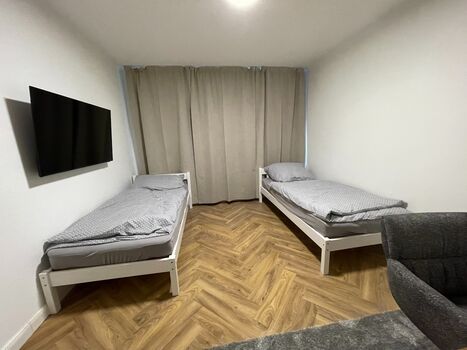 Schlafzimmer 1 mit 50 Zoll TV und wLAN Schlafzimmer 1 mit 50 Zoll TV und wLAN