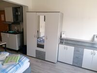 Geräumiges 1-Zimmer-Microapartment mit 3 Einzelbetten Zdjęcie 2 Geräumiges 1-Zimmer-Microapartment mit 3 Einzelbetten Zdjęcie 2