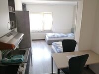 Geräumiges 1-Zimmer-Microapartment mit 3 Einzelbetten Zdjęcie 1 Geräumiges 1-Zimmer-Microapartment mit 3 Einzelbetten Zdjęcie 1