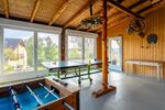 Auffenthaltsraum mit Tischkicker, Tischtennisplatte und Dart Auffenthaltsraum mit Tischkicker, Tischtennisplatte und Dart