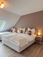 Schlafzimmer mit 3 Betten Schlafzimmer mit 3 Betten