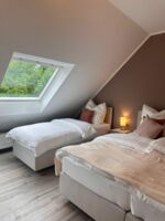Schlafzimmer mit 3 Betten Schlafzimmer mit 3 Betten