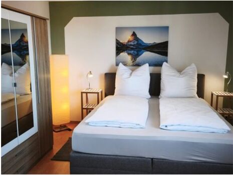 Doppelzimmer mit Boxspringbett Zimmer 1 Doppelzimmer mit Boxspringbett Zimmer 1
