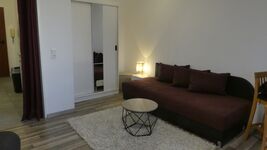 Wohnzimmer mit hochwertiger Studioliege Wohnzimmer mit hochwertiger Studioliege