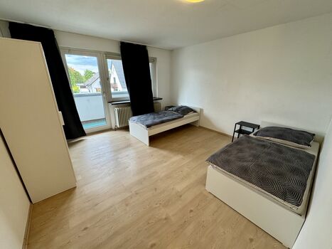 Monteurwohnung Langenfeld mit Tiefgarage – 4 Betten, Balkon, TV, WLAN Monteurwohnung Langenfeld mit Tiefgarage – 4 Betten, Balkon, TV, WLAN