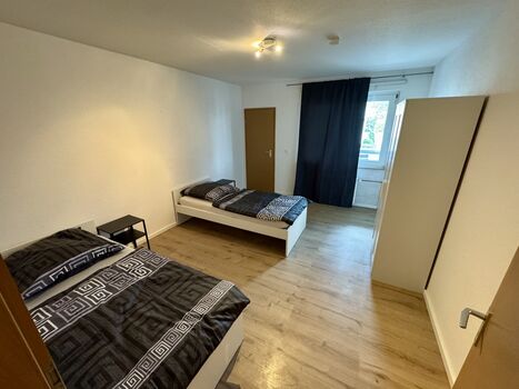 Monteurwohnung Langenfeld mit Tiefgaragenplatz – 4 Einzelbetten, Balkon Zdjęcie 3 Monteurwohnung Langenfeld mit Tiefgaragenplatz – 4 Einzelbetten, Balkon Zdjęcie 3