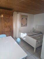Bett Gartenhaus-Wohnung Bett Gartenhaus-Wohnung