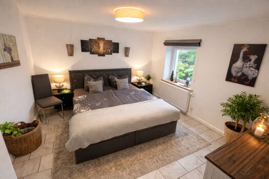 Schlafzimmer in der ersten Etage Schlafzimmer in der ersten Etage