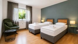 Haus Frey mit Parkplätzen ( 4 Wohnungen: 1 BR, 3x3 BR bis 8 Personen) Zdjęcie 1 Haus Frey mit Parkplätzen ( 4 Wohnungen: 1 BR, 3x3 BR bis 8 Personen) Zdjęcie 1