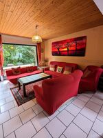 Wohnzimmer im EG mit vielen Sitzmöglichkeiten Wohnzimmer im EG mit vielen Sitzmöglichkeiten