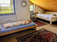 Schlafzimmer im Haus gegenüber Schlafzimmer im Haus gegenüber