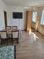 Doppelzimmer mit TV und Esstisch Doppelzimmer mit TV und Esstisch