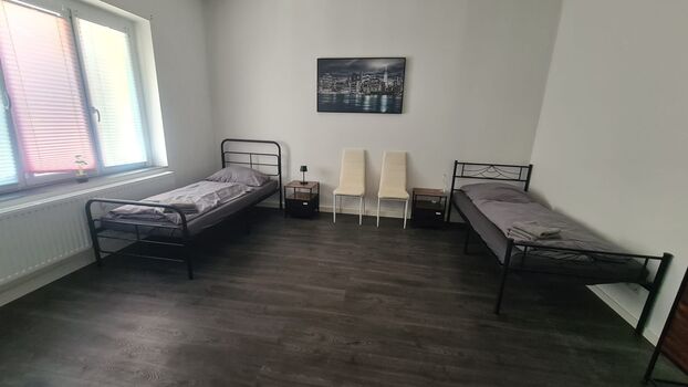 Schlafzimmer 1 mit 2 Einzelbetten Schlafzimmer 1 mit 2 Einzelbetten