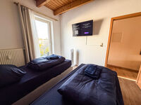 Schlafzimmer 1 mit Fernseher Schlafzimmer 1 mit Fernseher