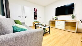 Wohnzimmer / Esszimmer bis 7 Personen mit TV und Schlafcouch Wohnzimmer / Esszimmer bis 7 Personen mit TV und Schlafcouch