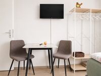 Schlafzimmer3 - Sitzbereich inklusive Smart-TV Schlafzimmer3 - Sitzbereich inklusive Smart-TV