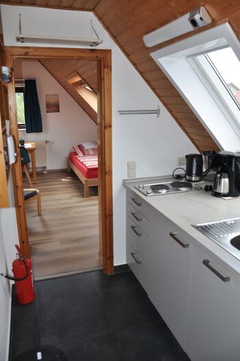 Schöne DG-Wohnung mit Gartensitzplatz Zdjęcie 3 Schöne DG-Wohnung mit Gartensitzplatz Zdjęcie 3