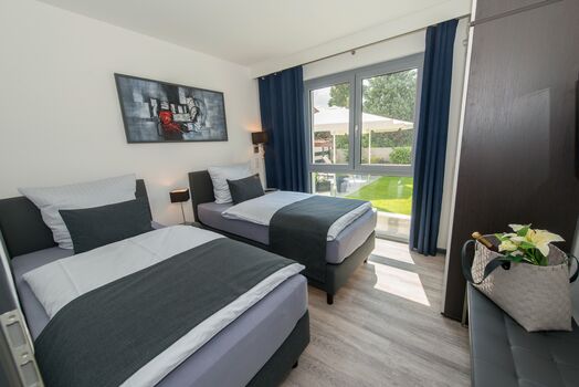 Separate Schlafzimmer mit Einzelbetten Separate Schlafzimmer mit Einzelbetten