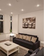 Wohnung 1: Wohnzimmer Wohnung 1: Wohnzimmer