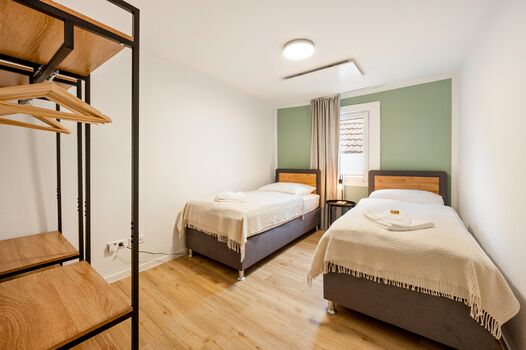 Schlafzimmer mit zwei Einzelbetten Schlafzimmer mit zwei Einzelbetten
