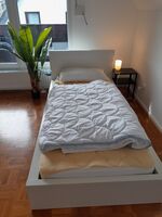 Schlafzimmer 1 mit Queen Size Bett und Einzelbett Schlafzimmer 1 mit Queen Size Bett und Einzelbett