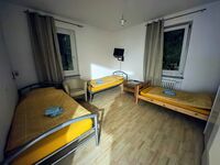 Schlafzimmer 1 mit 3 Einzelbetten Schlafzimmer 1 mit 3 Einzelbetten
