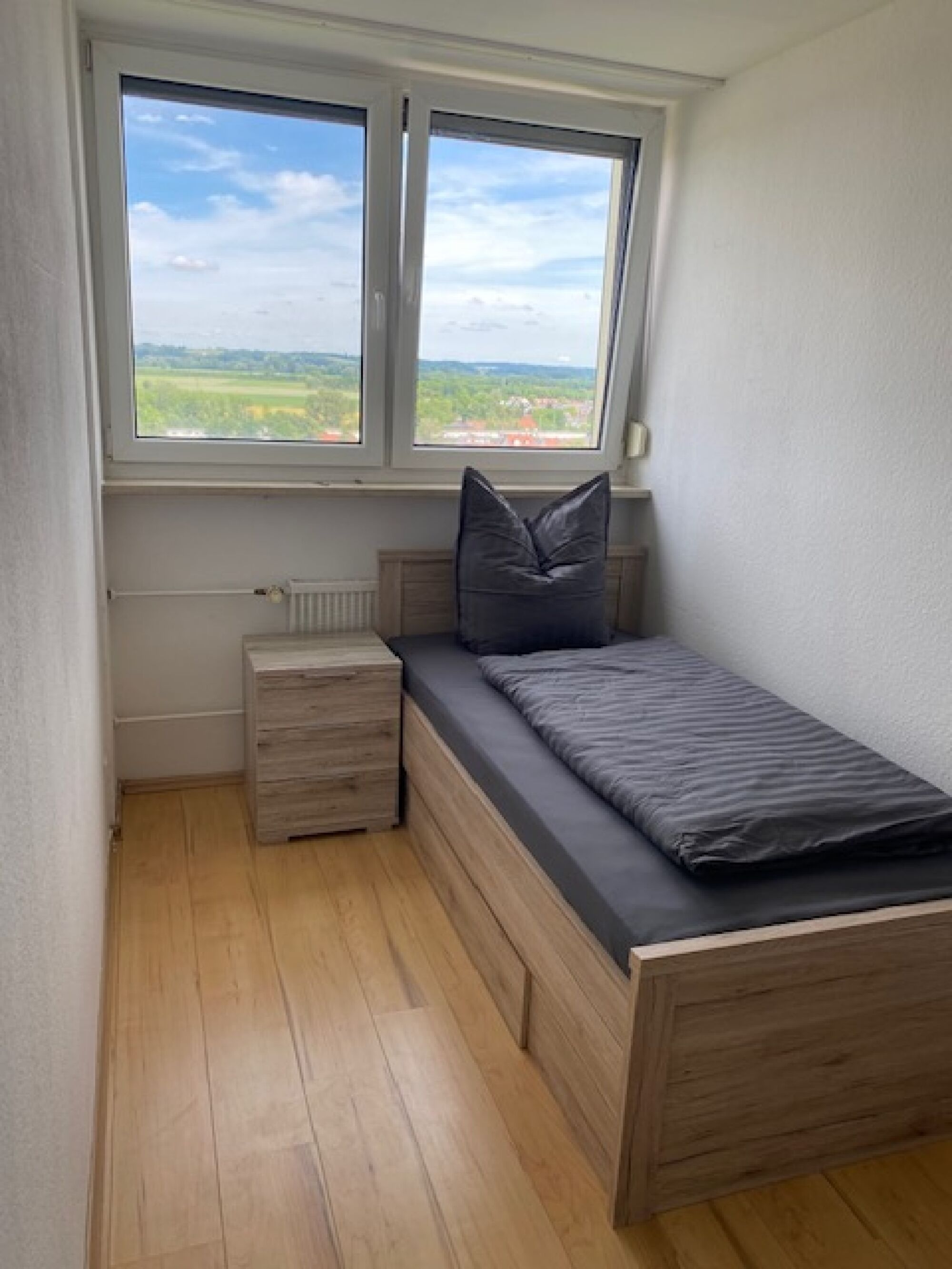 Schlafzimmer mit einen Bett Schlafzimmer mit einen Bett