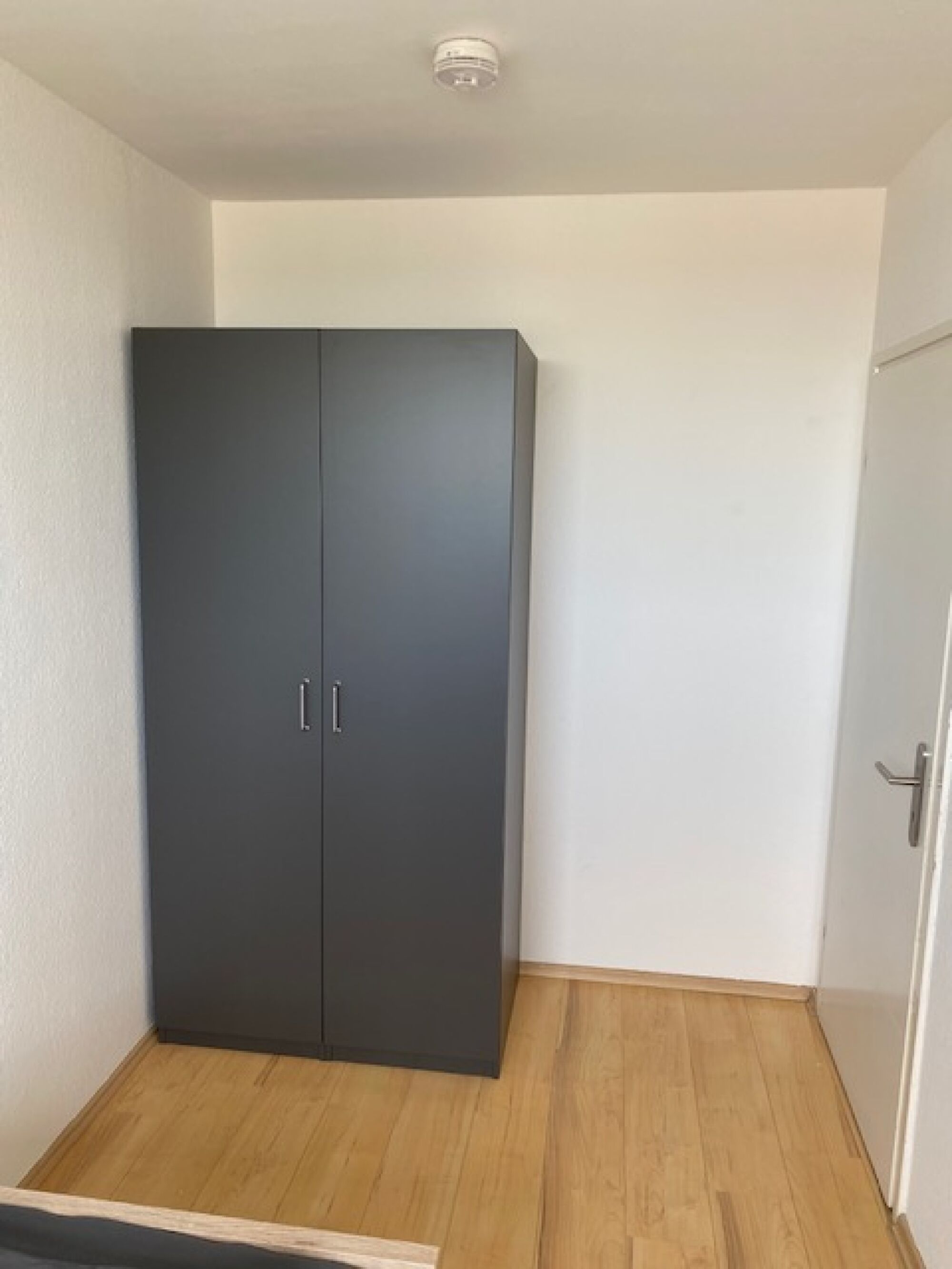 Schlafzimmer mit einem Bett Schlafzimmer mit einem Bett