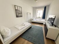Schlafzimmer mit zwei Einzelbetten