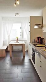 Küche mit Sitzmöglichkeiten