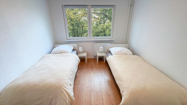 Einzelbetten, WLAN, Küche, Parkplatz, TV - ganze Wohnung Bild 3