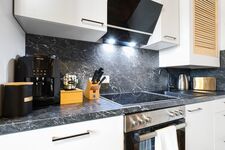 Küche mit Kaffevollautomat