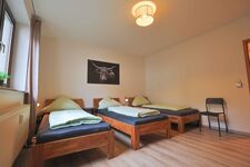 Schlafzimmer mit 3 Betten