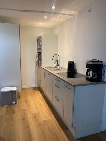 Ferienwohnung mit offener Wohnküche und 2 Schlafzimmern Bild 1