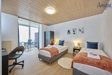 AMIGOS Apartments Plattling | Modern & Zentral Bild 2