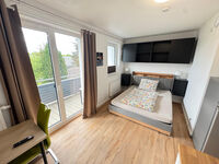 Apartments mit eigenem Bad und Kuchenzeile Bild 13