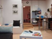 Wohnzimmer mit zusätzlicher Schlafmöglichkeit