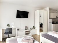 Apartments in the city center I private parking I kitchen Bild 9