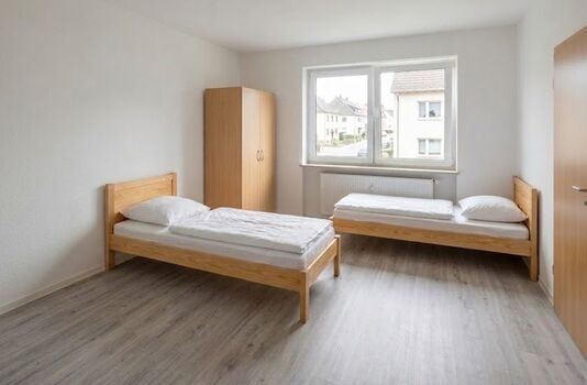 Monteurunterkünfte in Nieder-Erlenbach – 24h Check-In