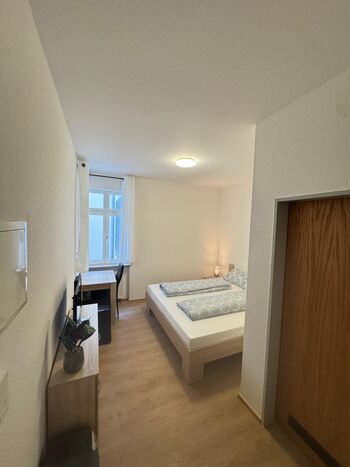 Kompakte Wohnung ohne Küche am Marktplatz Bild 3