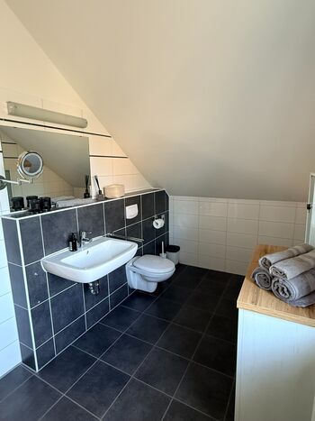 Der Kutscher · Schlössle Lodge am Rhein Bild 3