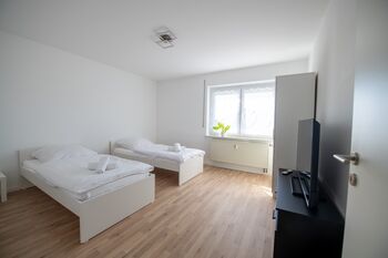 W&P Living: Wohnung mit Ausblick- Parkplatz